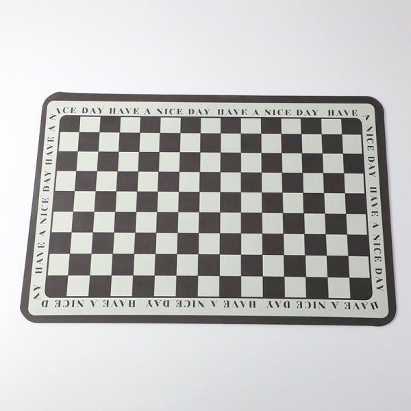 Black and white checkered absorbent floor mat
